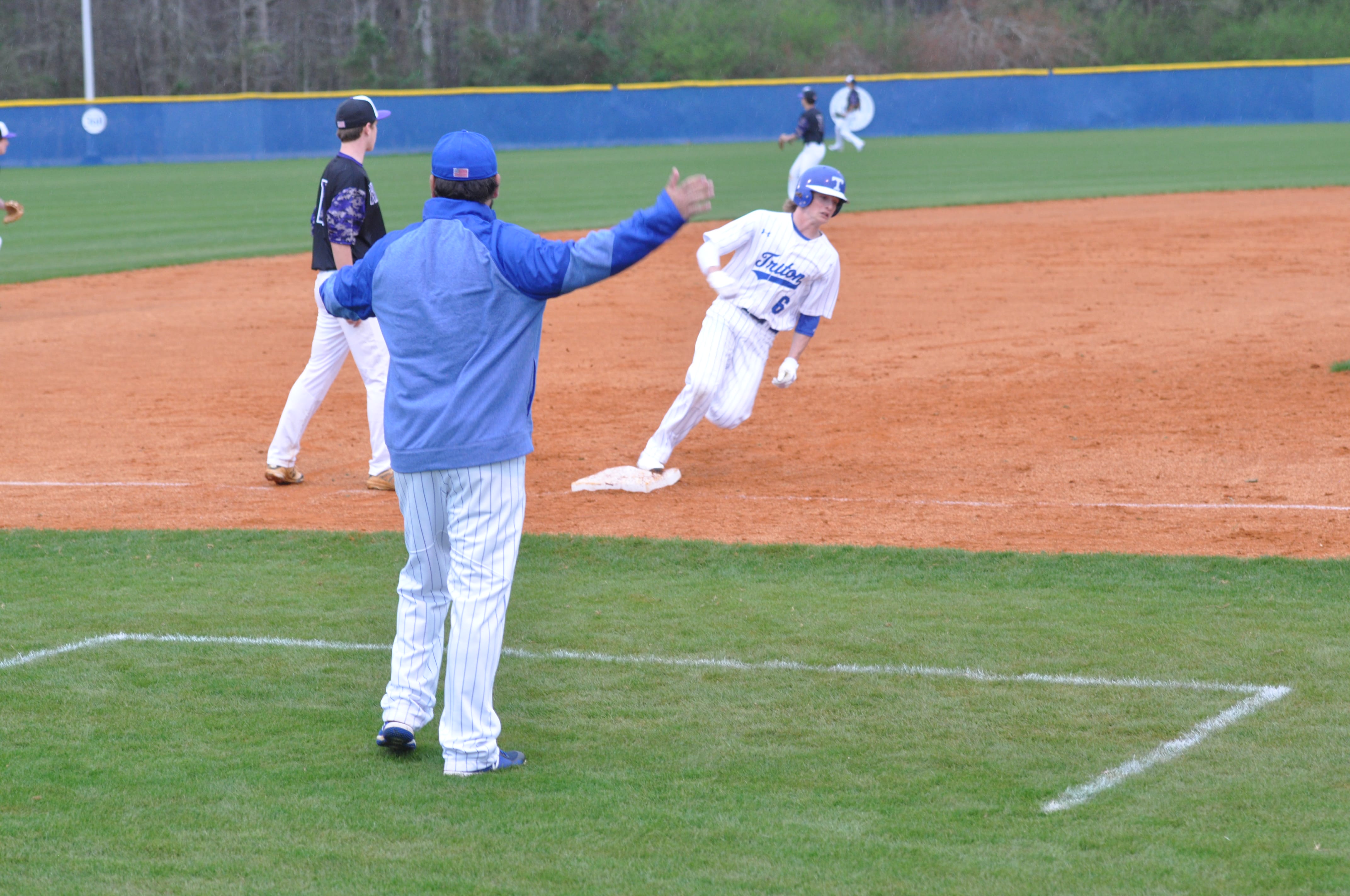 Hawks pull out 9-8 win in baseball opener