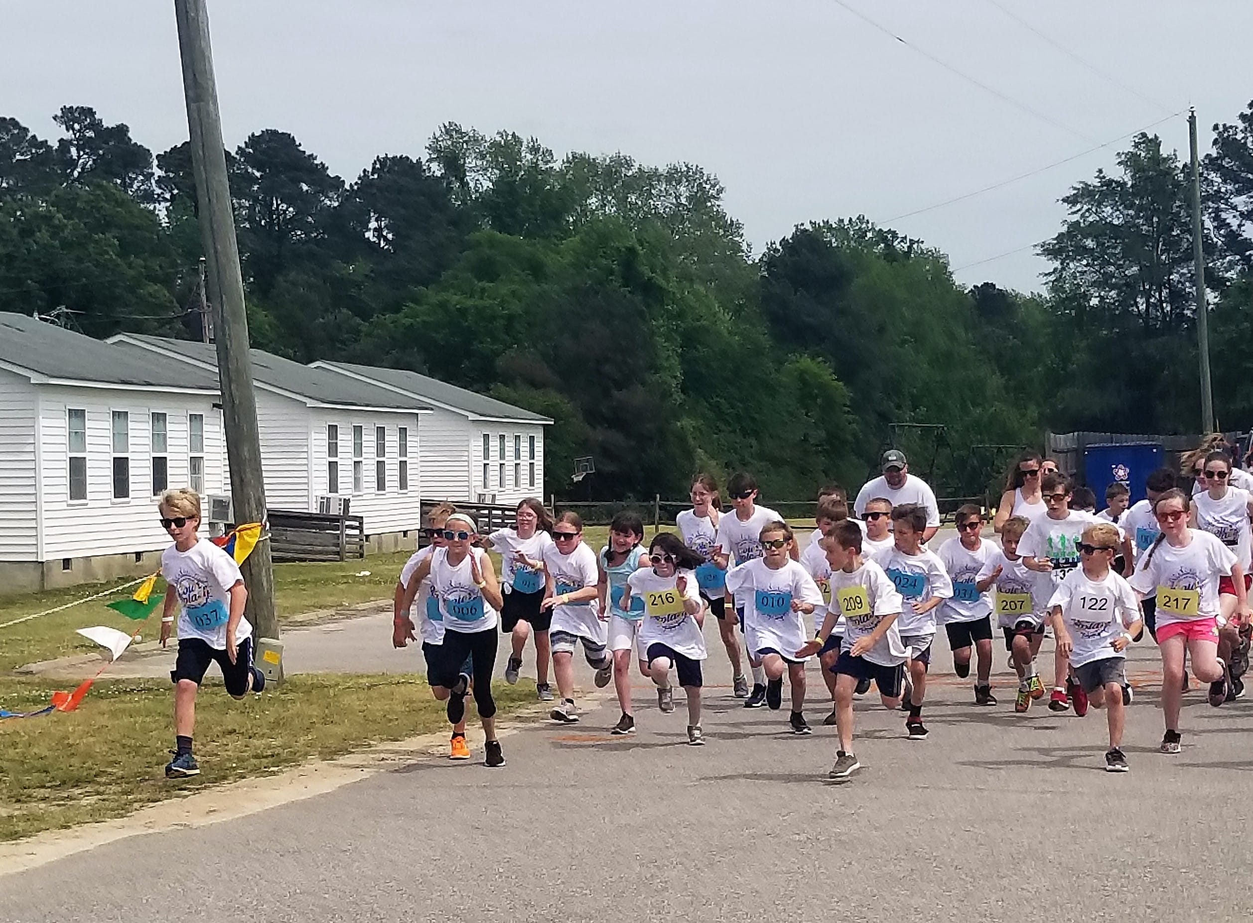 CFCA has mile run, slip and slide fun