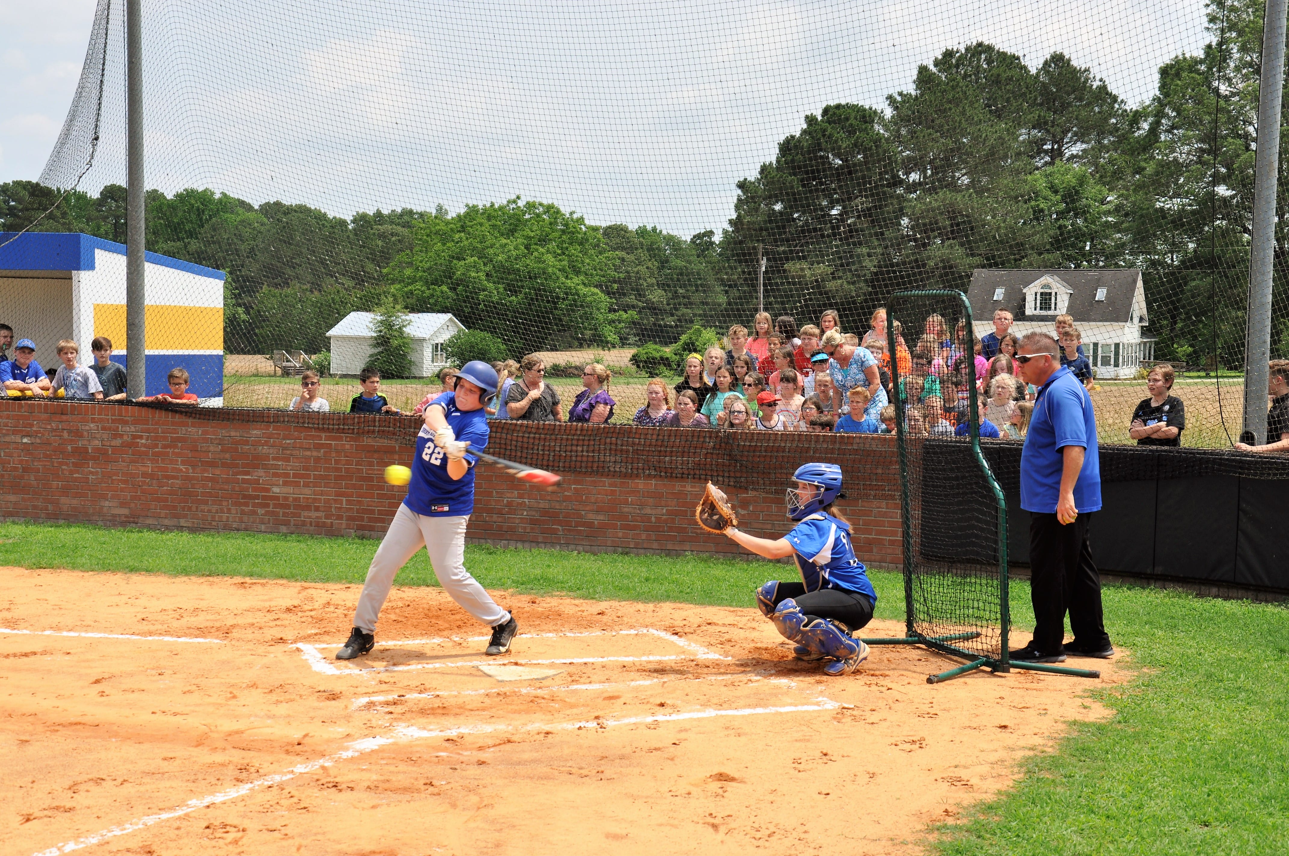 Baseball-softball game ends in tie