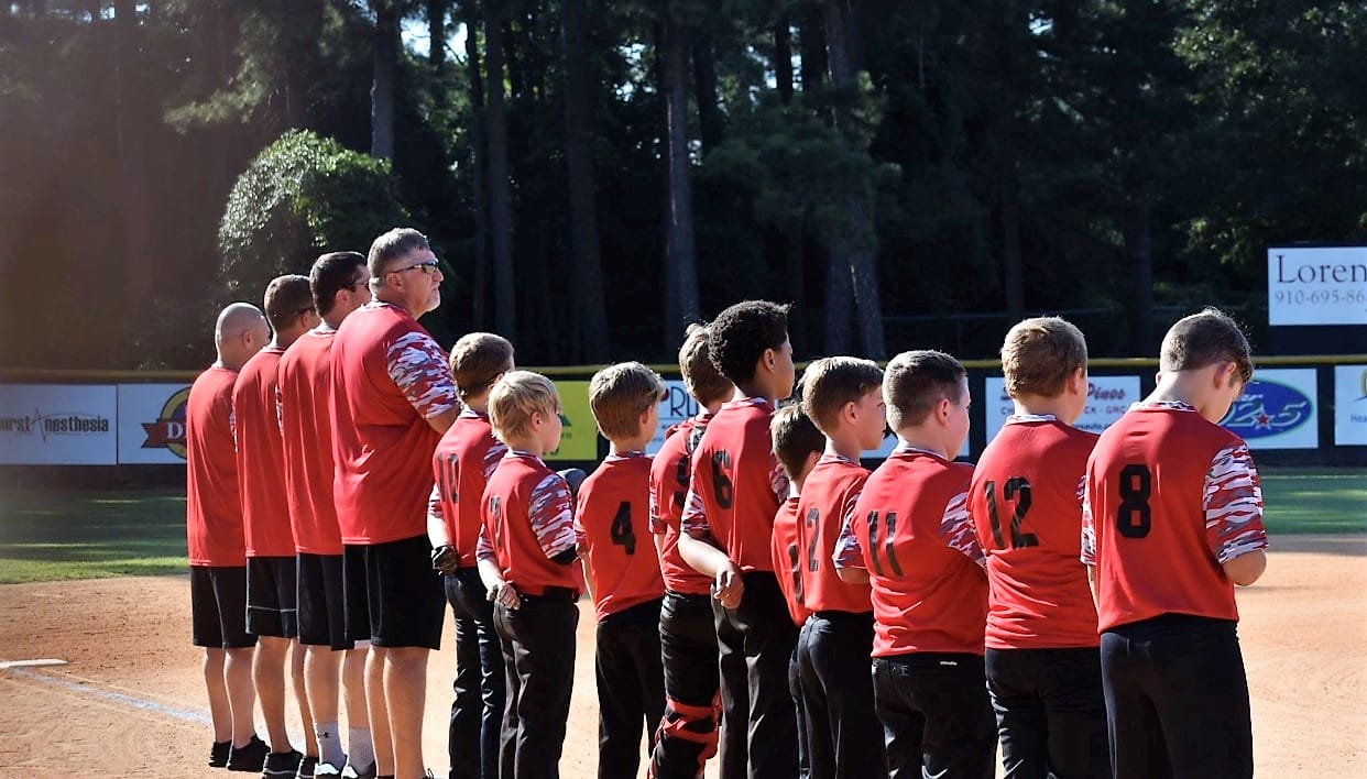 Erwin wins 10-U baseball opener