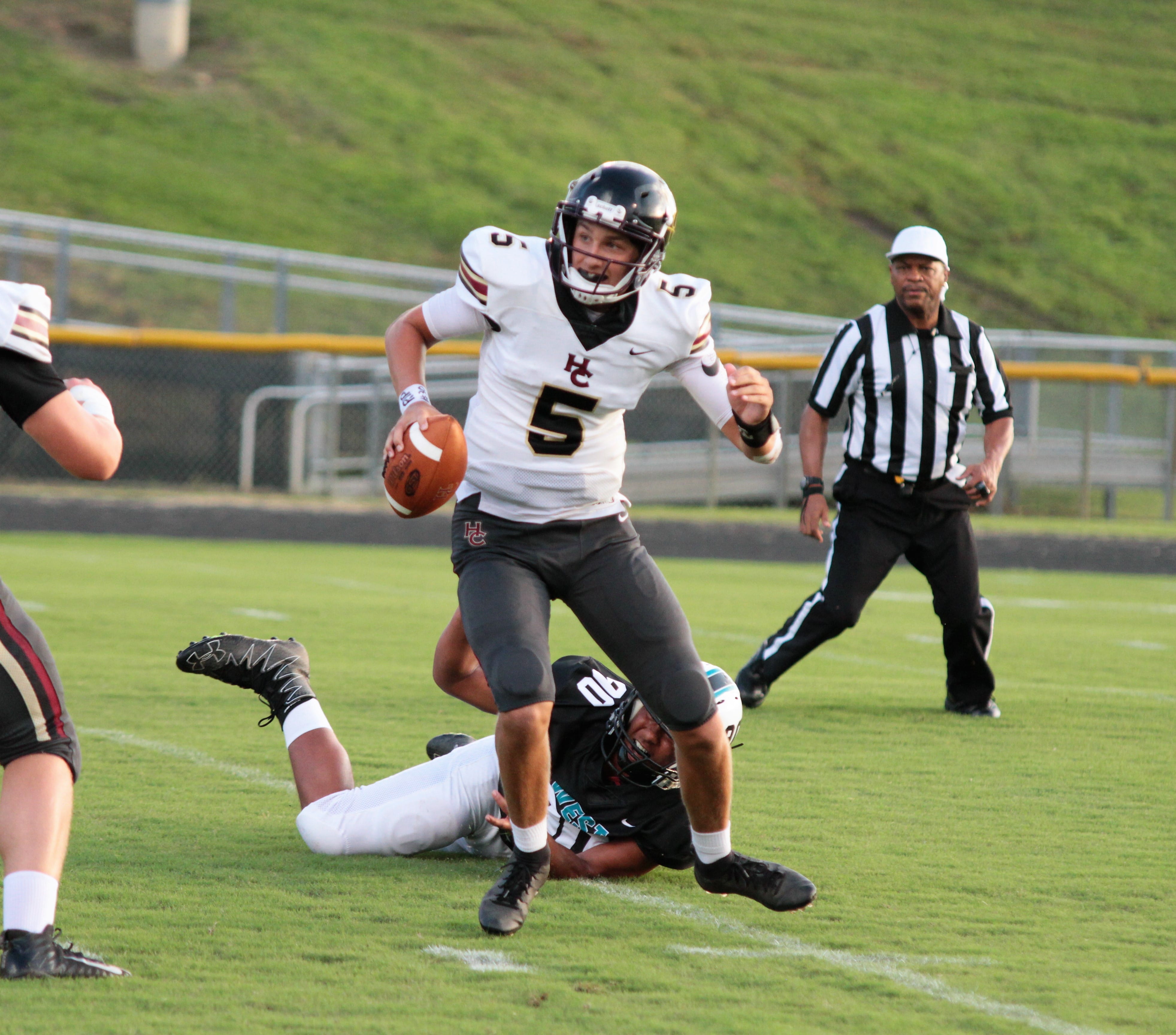 Wildcats overtake HC, 31-22