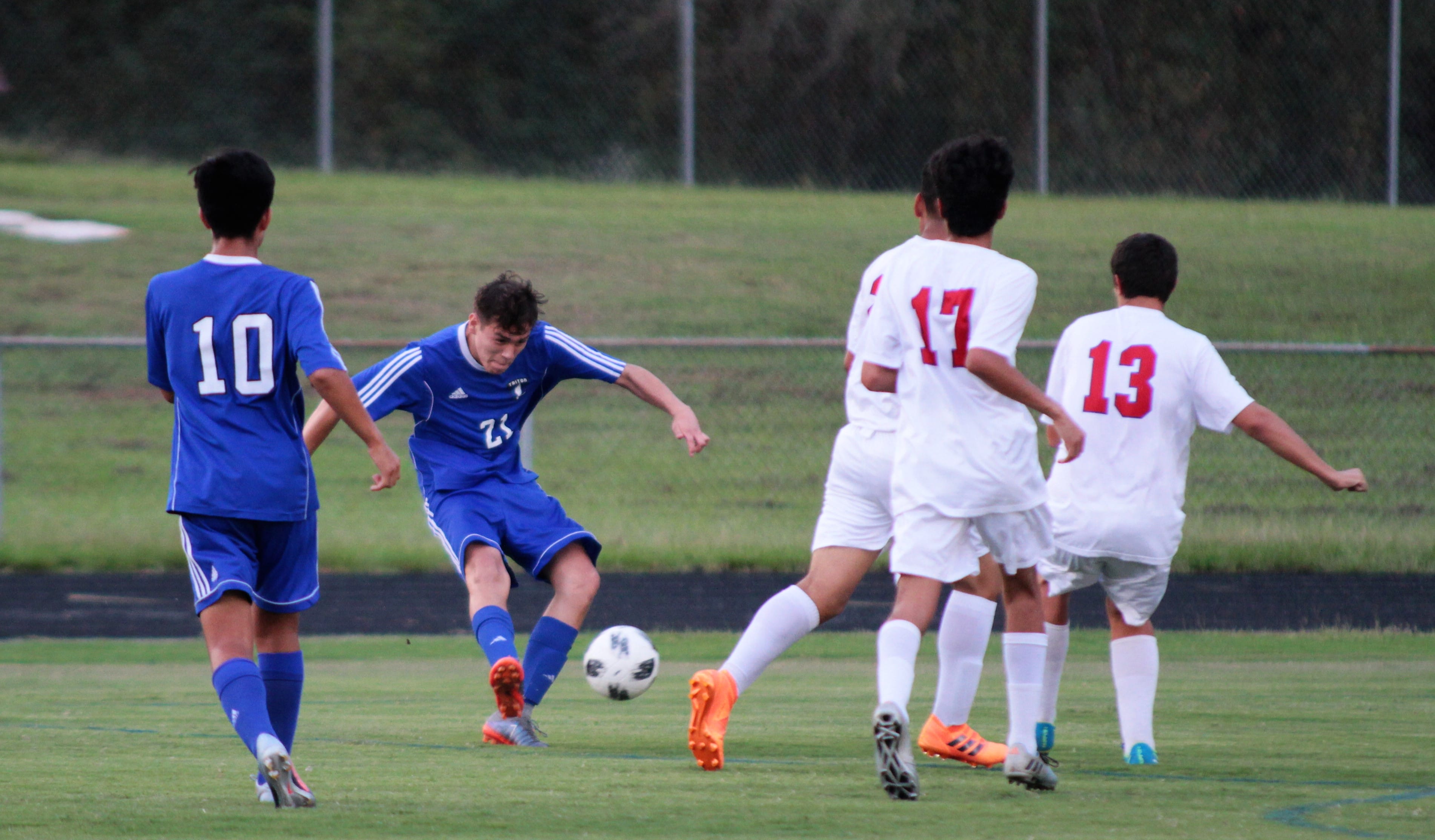 Triton takes league soccer opener