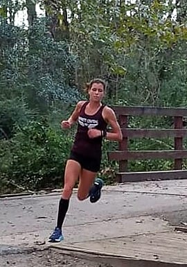 Maggie McCormick wins girls conference cross country championship