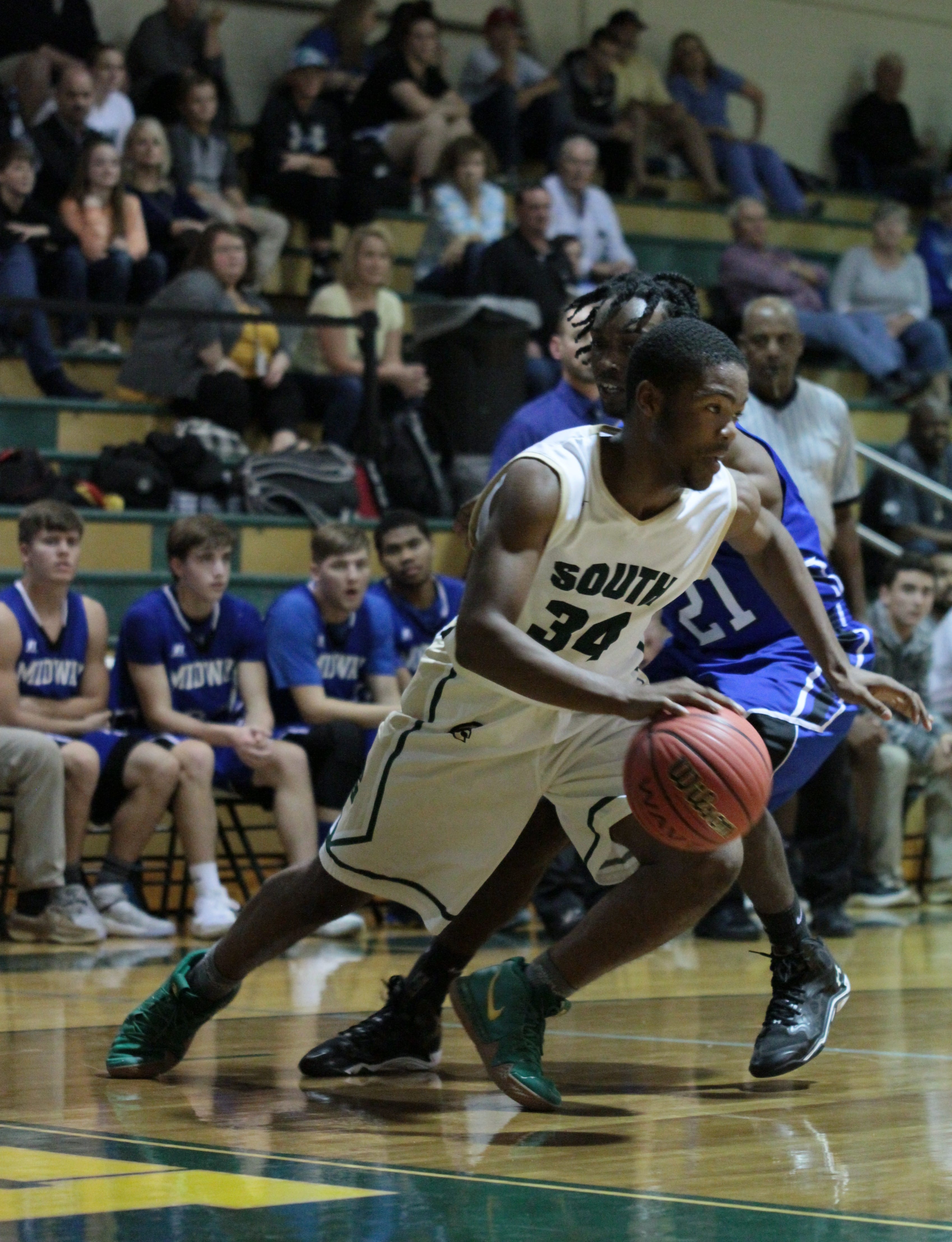 South boys turn back Midway, 66-42, as C.J. Ray scores 24