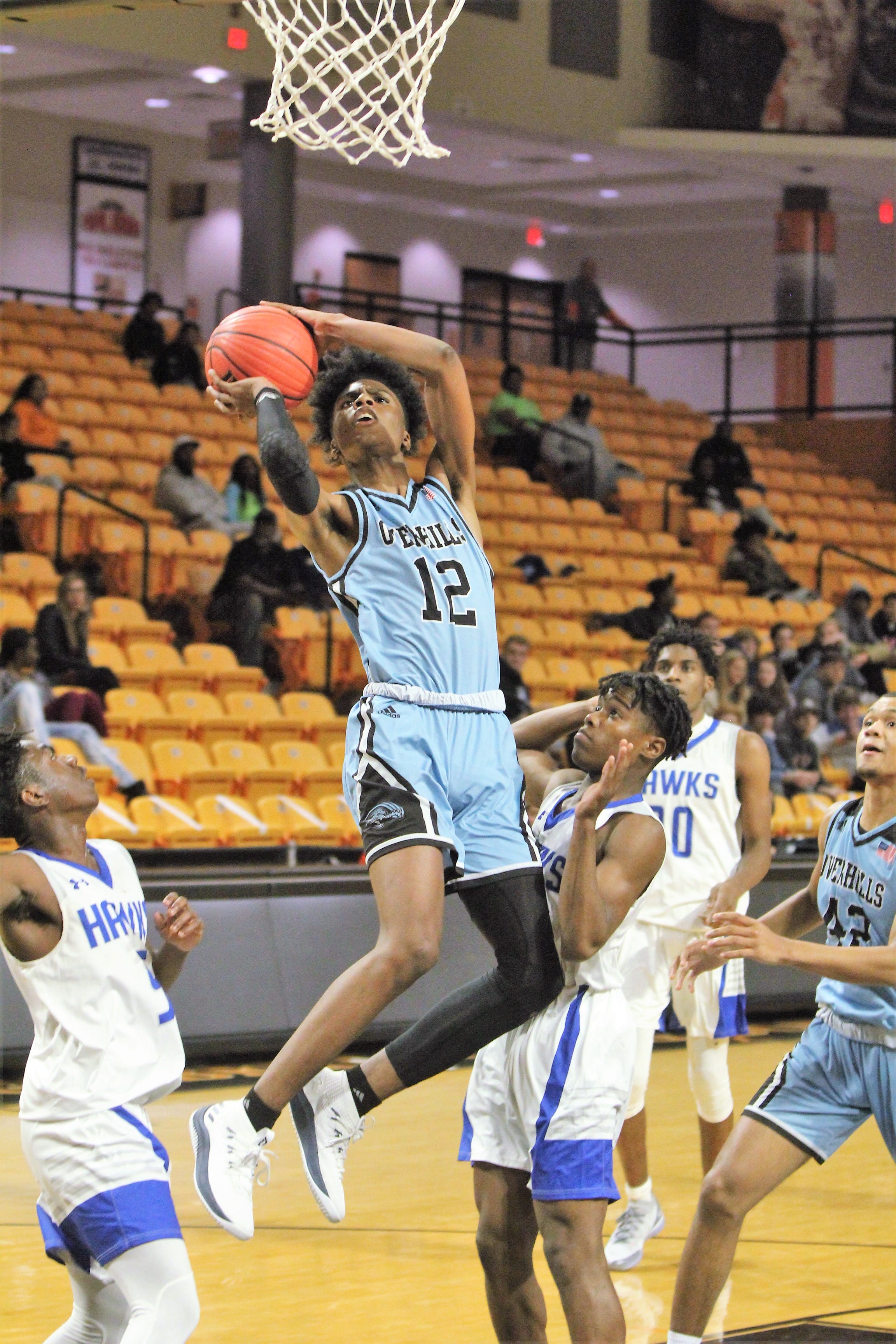 Jaguars edge Hawk boys as Overhills sweeps Tipoff finals