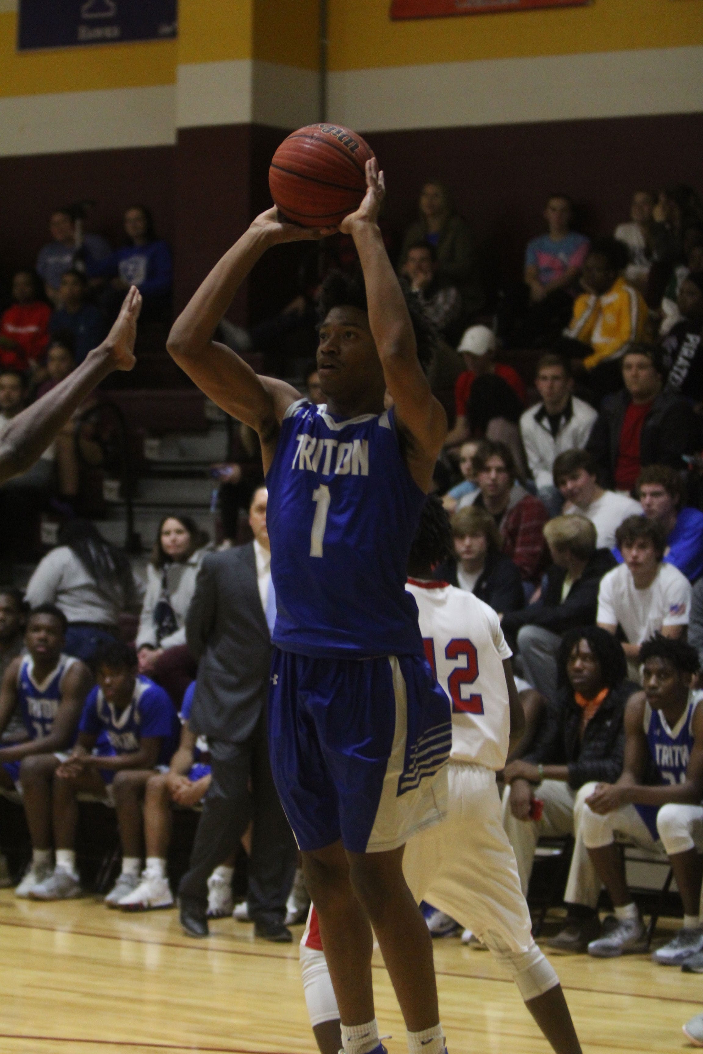 Hawks advance in double OT with 62-58 win over Western