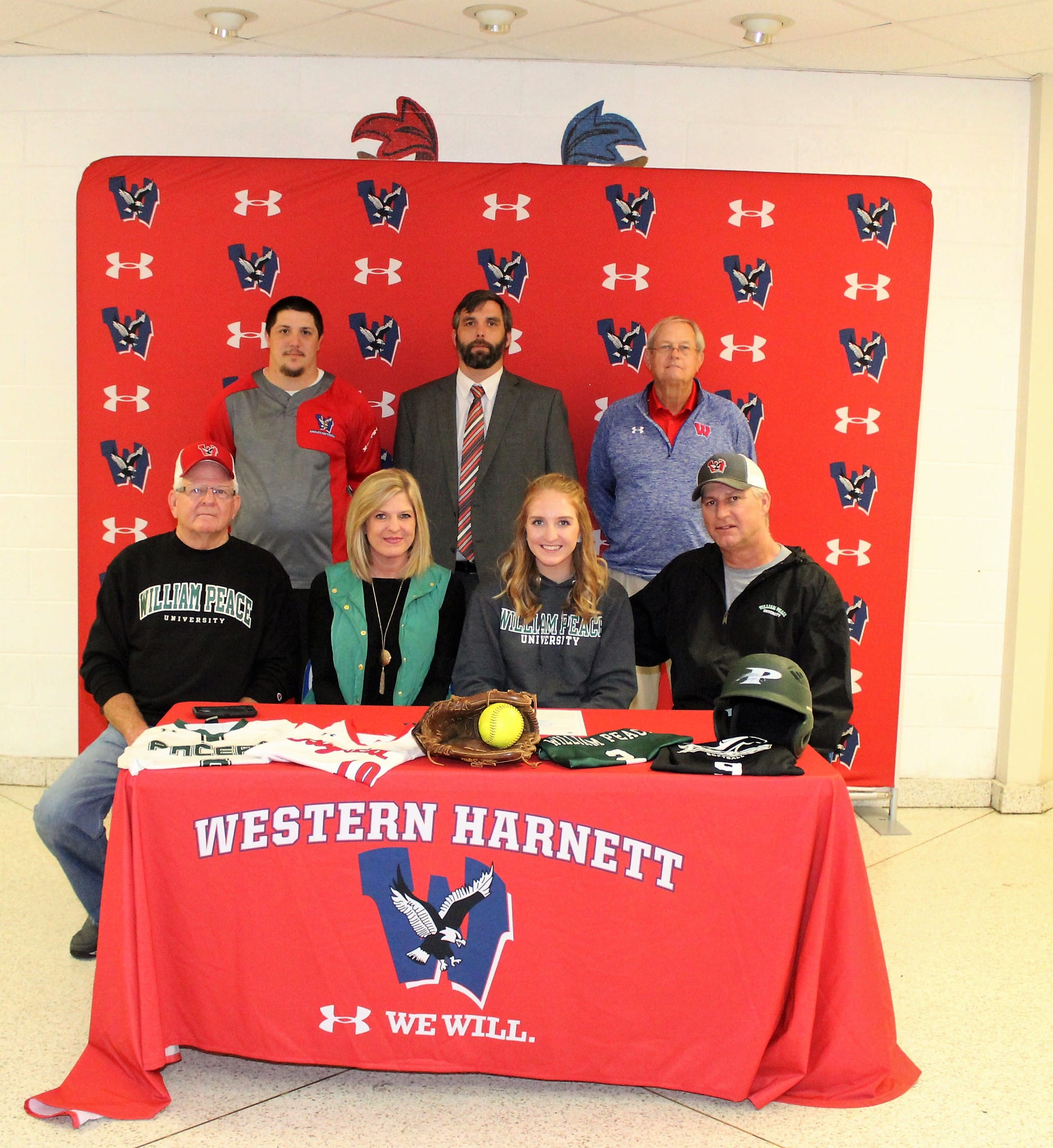 Madison Farmer of Western signs to play softball at Peace