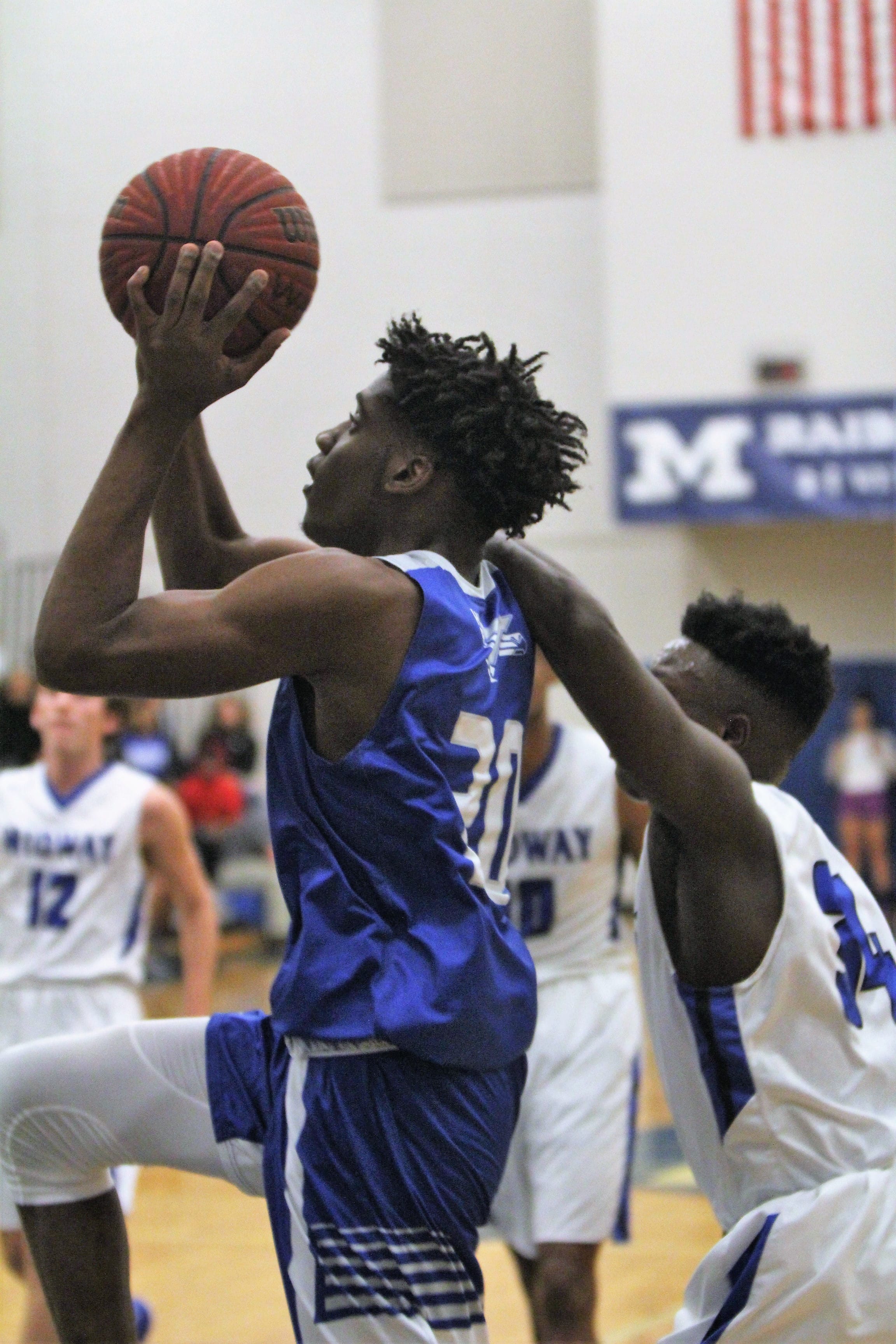 Triton boys down host Midway, 71-60, as Burnett has 19 points