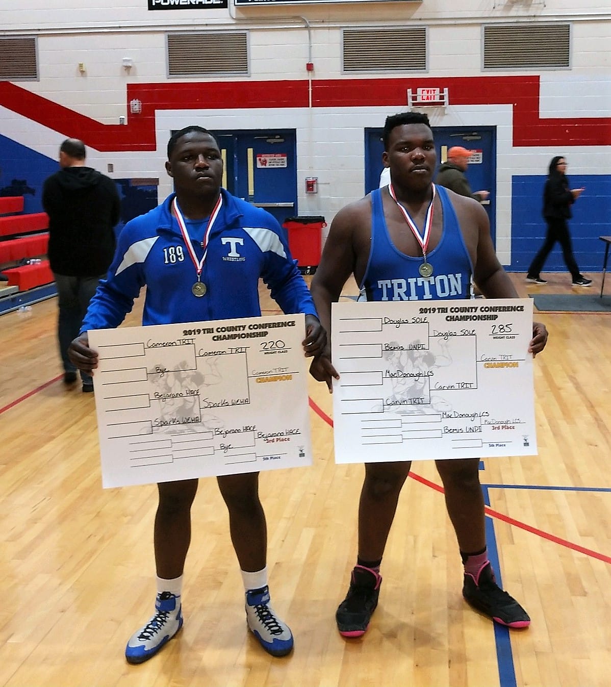 Hawk wrestlers Cameron, Carvin claim league championships