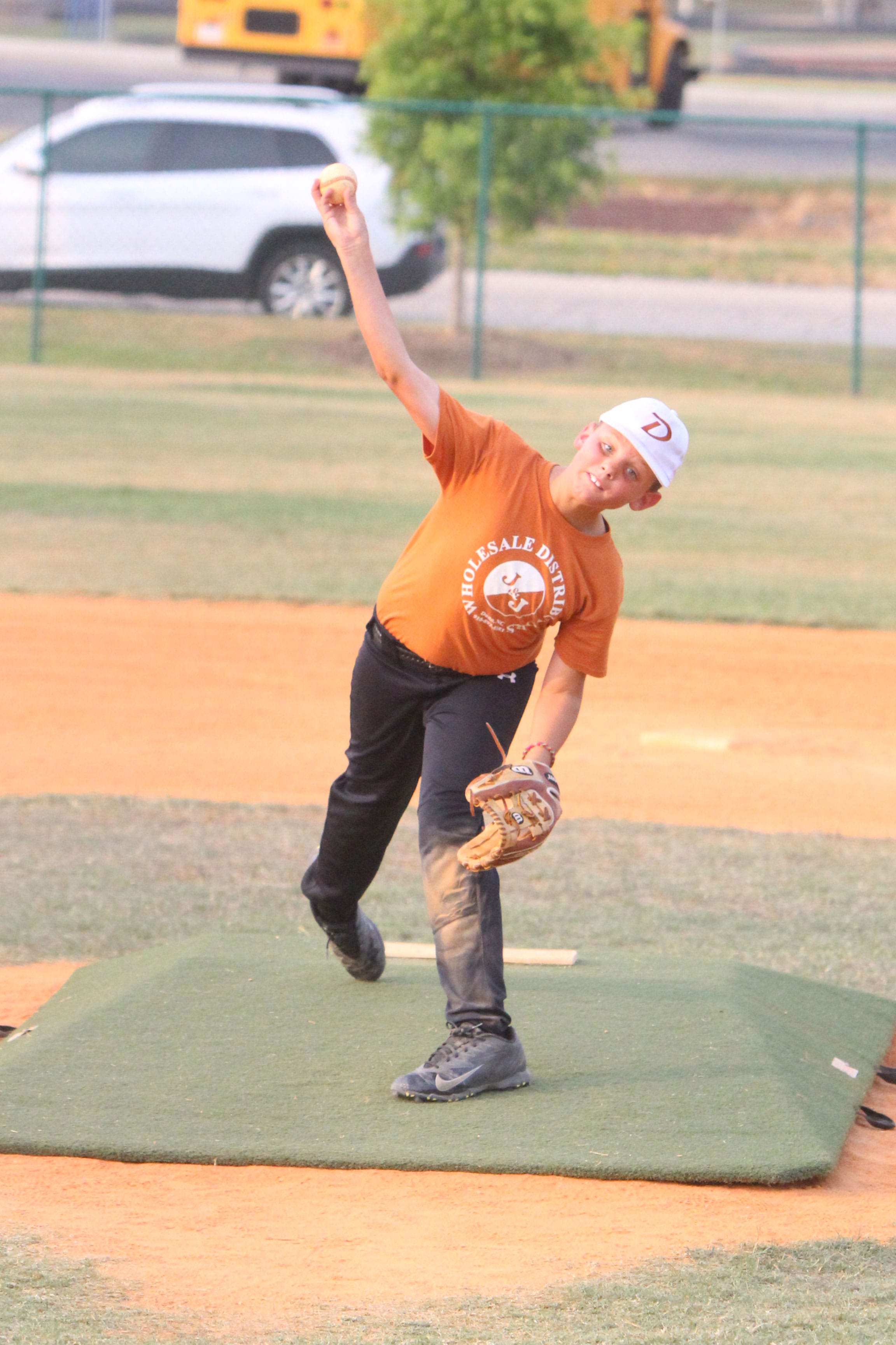 Dunn Majors win opener in Lillington, Ponytails softball takes district wins