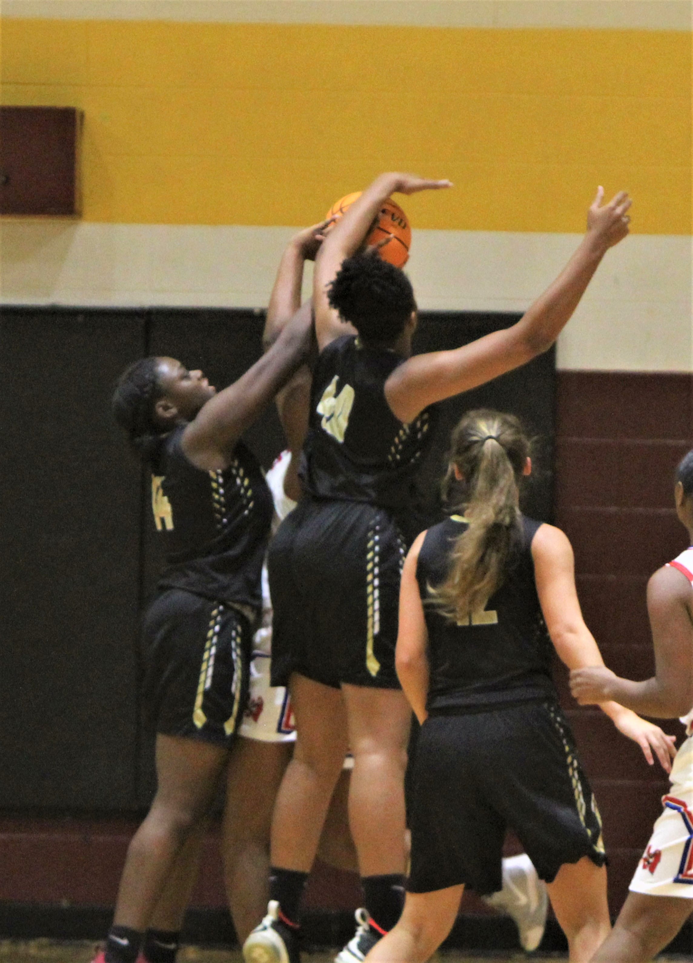 HC moves into girls final by downing WH, 54-18