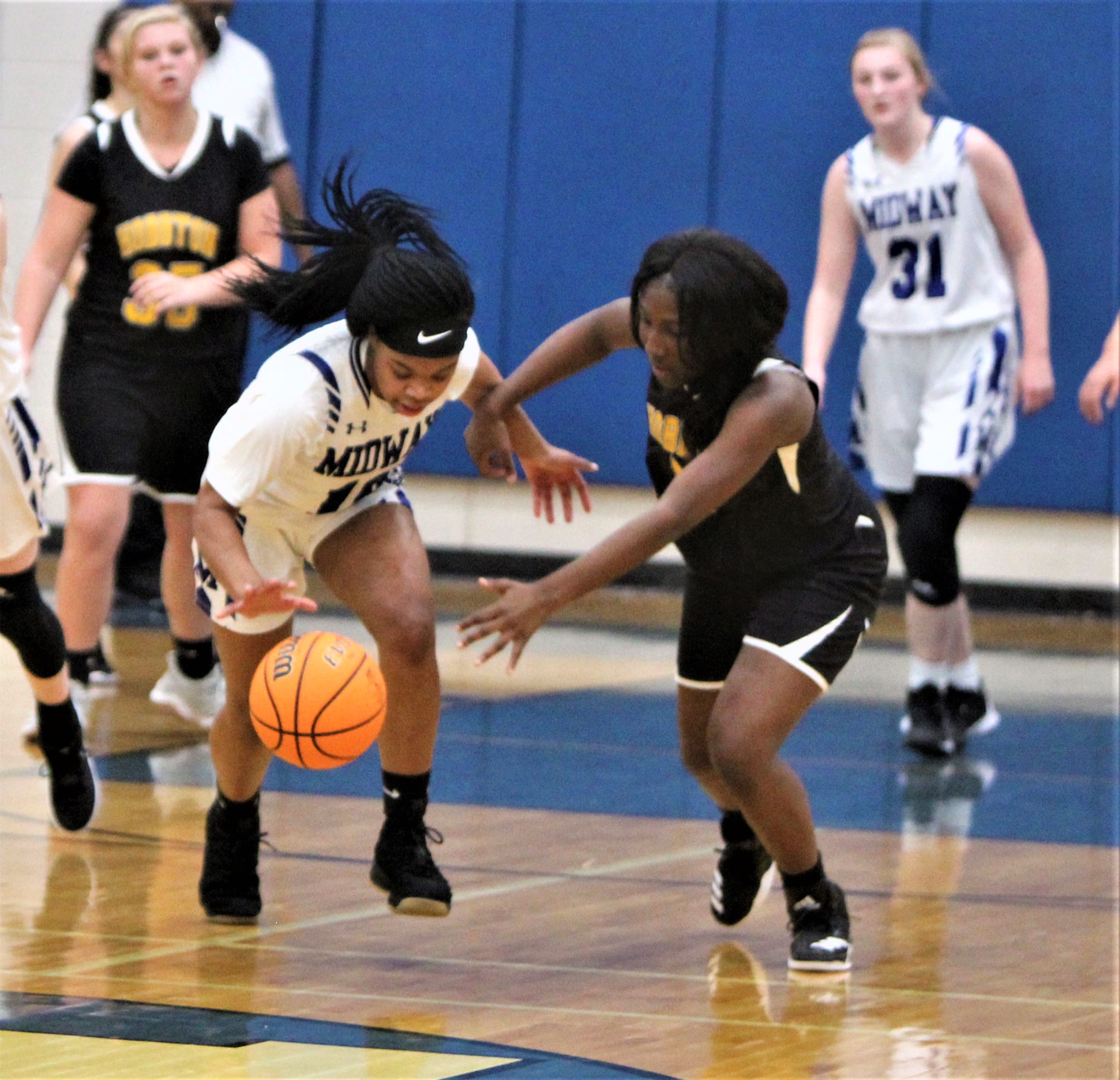 Midway tames Wildcats