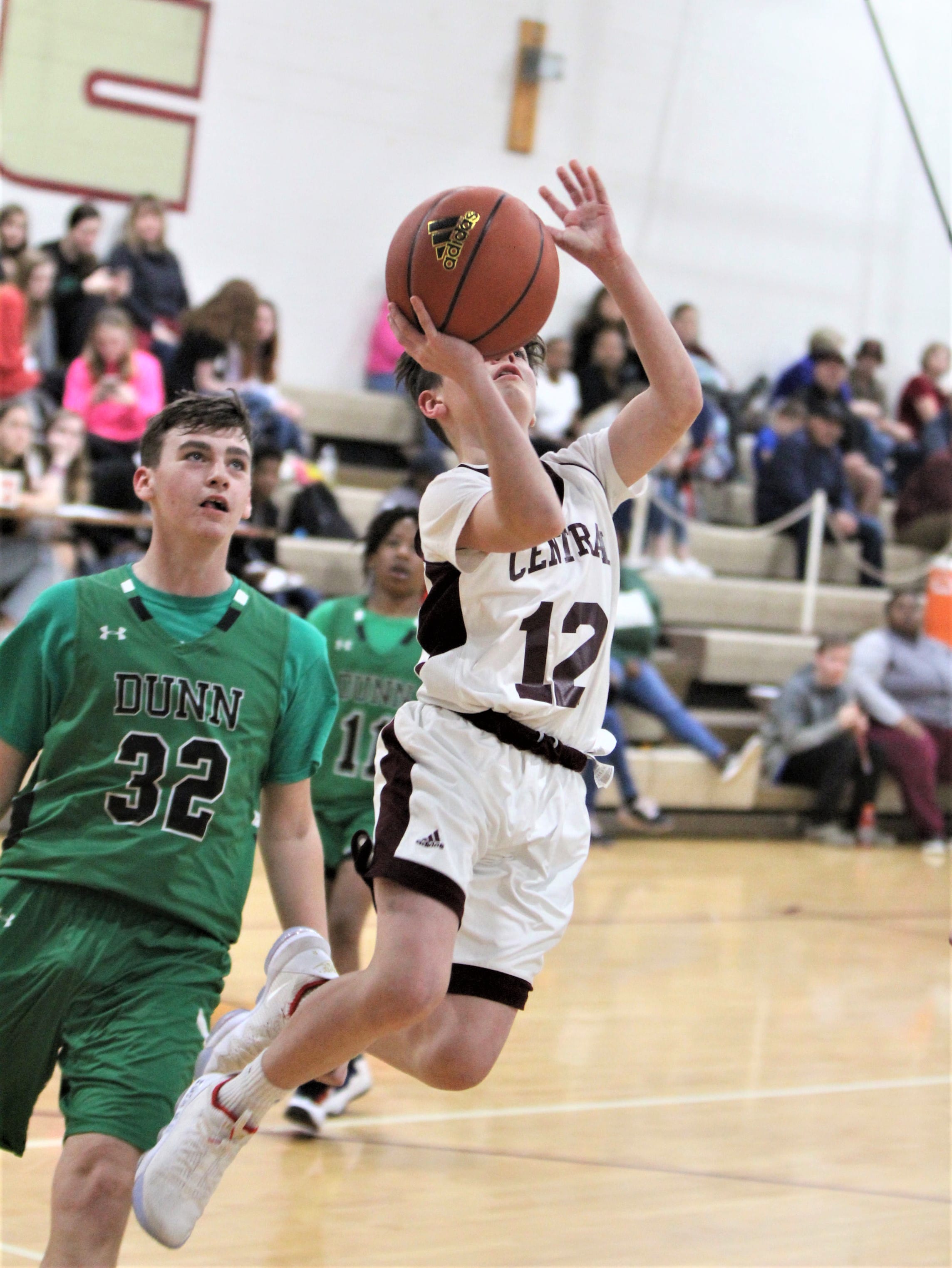 Dunn wins pair at Central, Greenwave boys move to 9-0