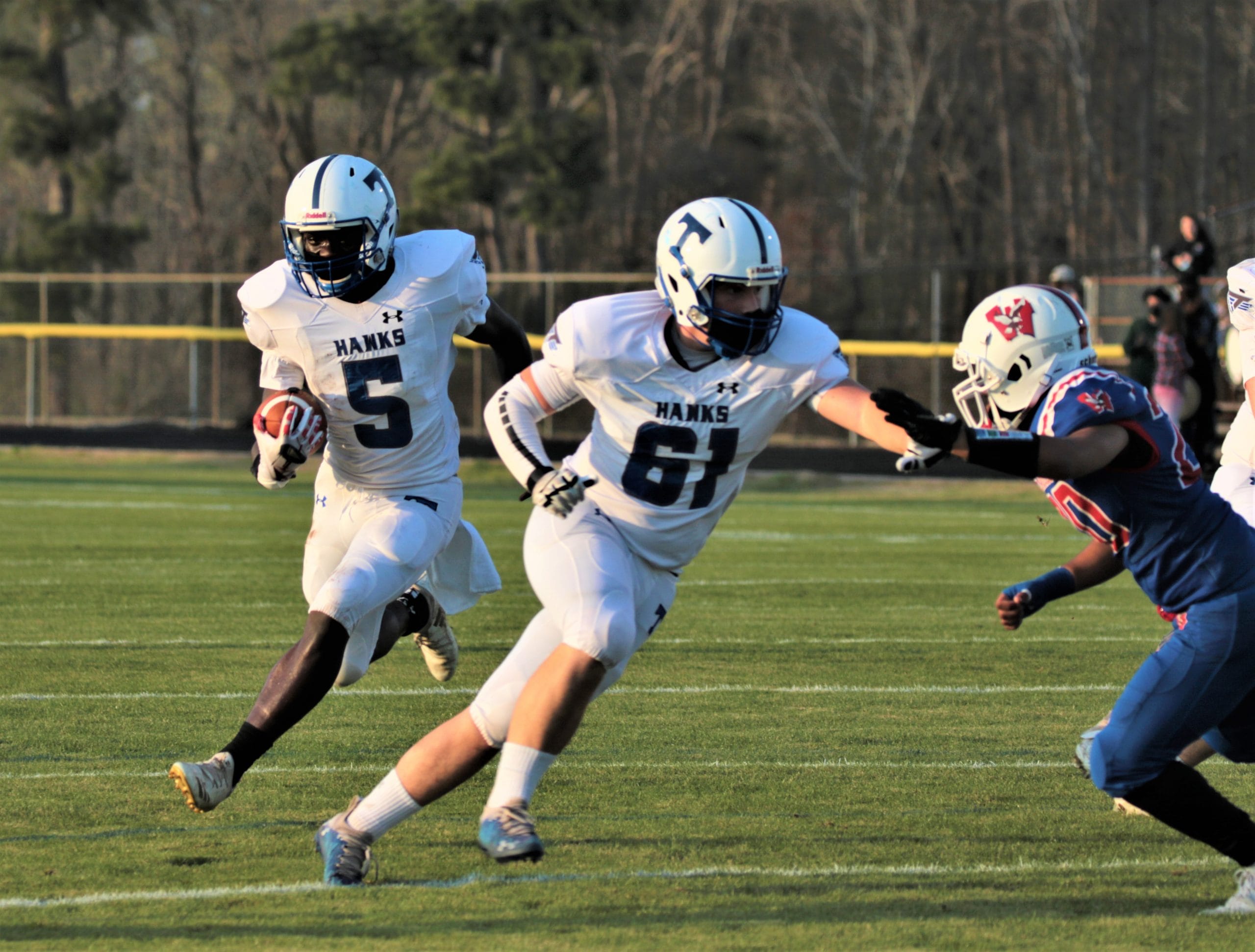 Triton wins, 43-20, at Western