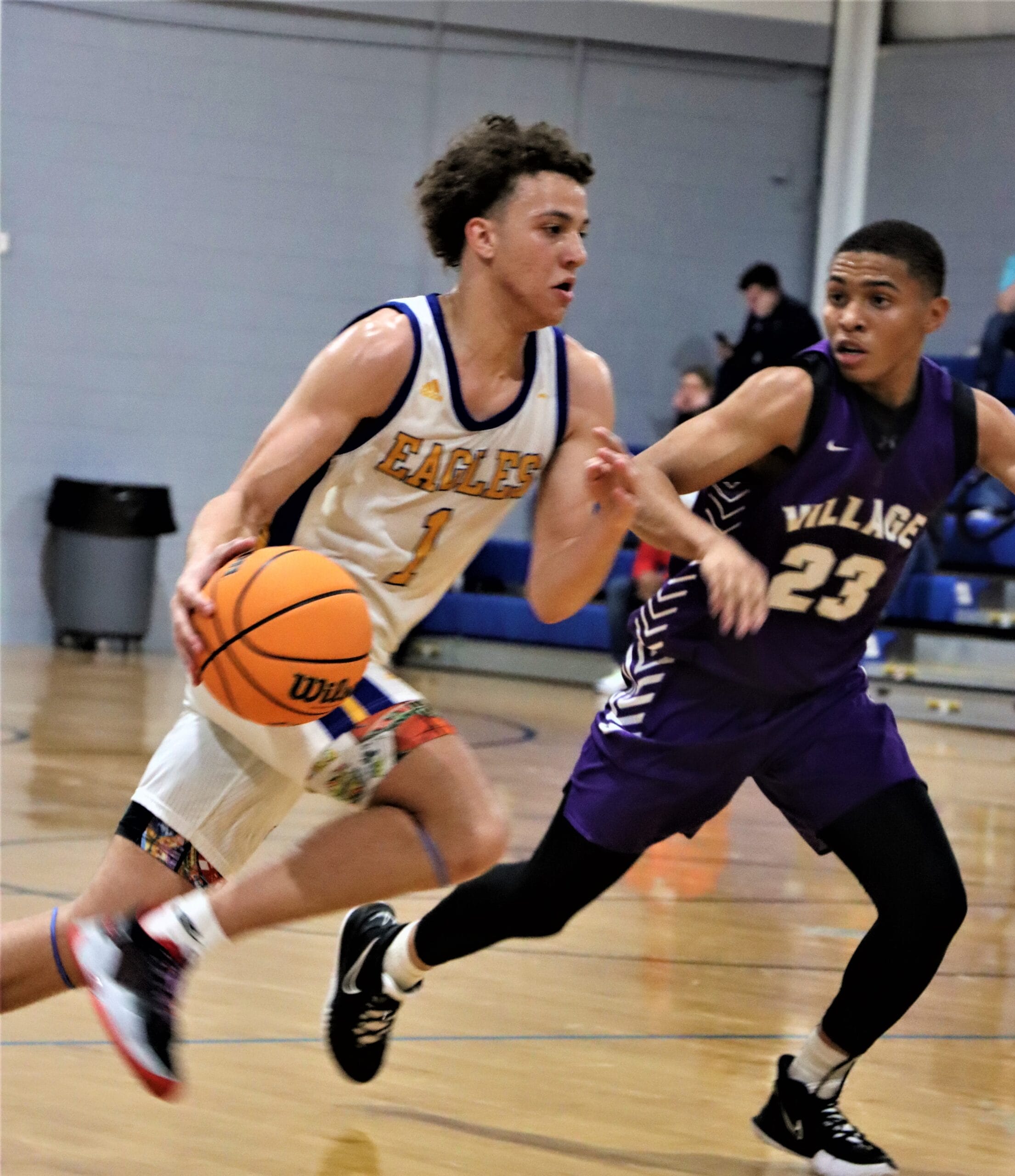 Woods scores 36 as CFCA boys defeat Village, 76-57