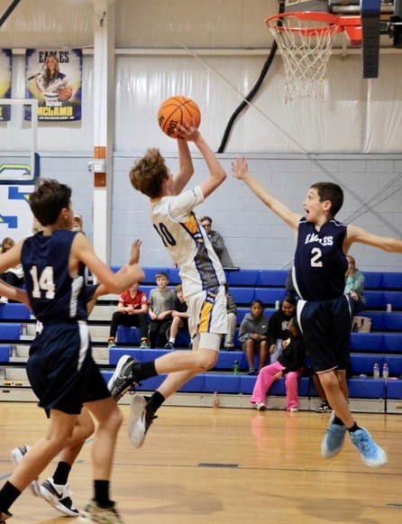 Middle school boys defeat St. John Paul II as Shwaikeh registers double-double