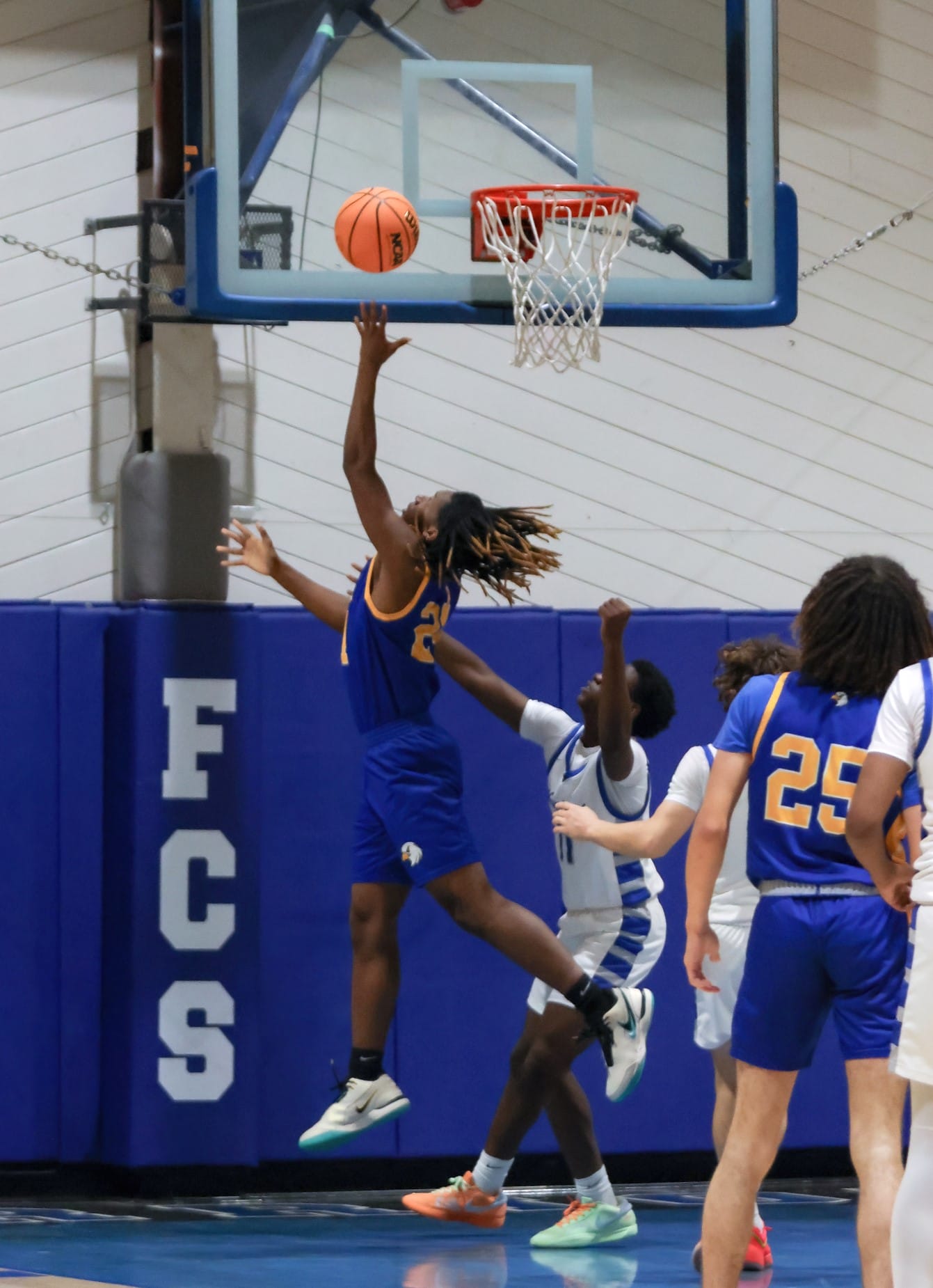 Balanced scoring helps Eagles to 64-56 victory at Fayetteville Christian