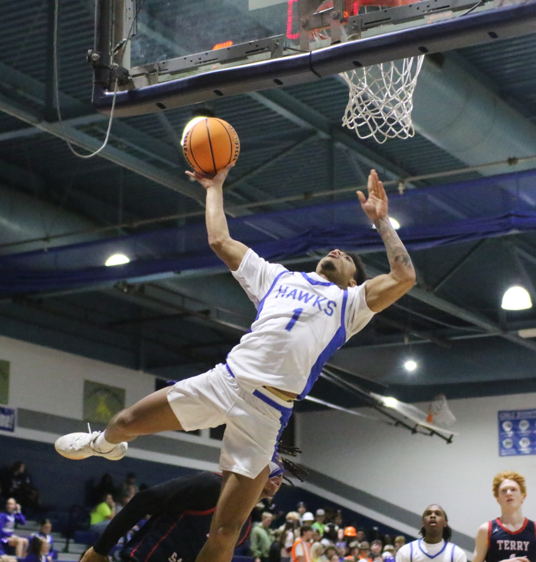 Hawk hoops this week: boys streak stopped, Smith honored for 1,000th point