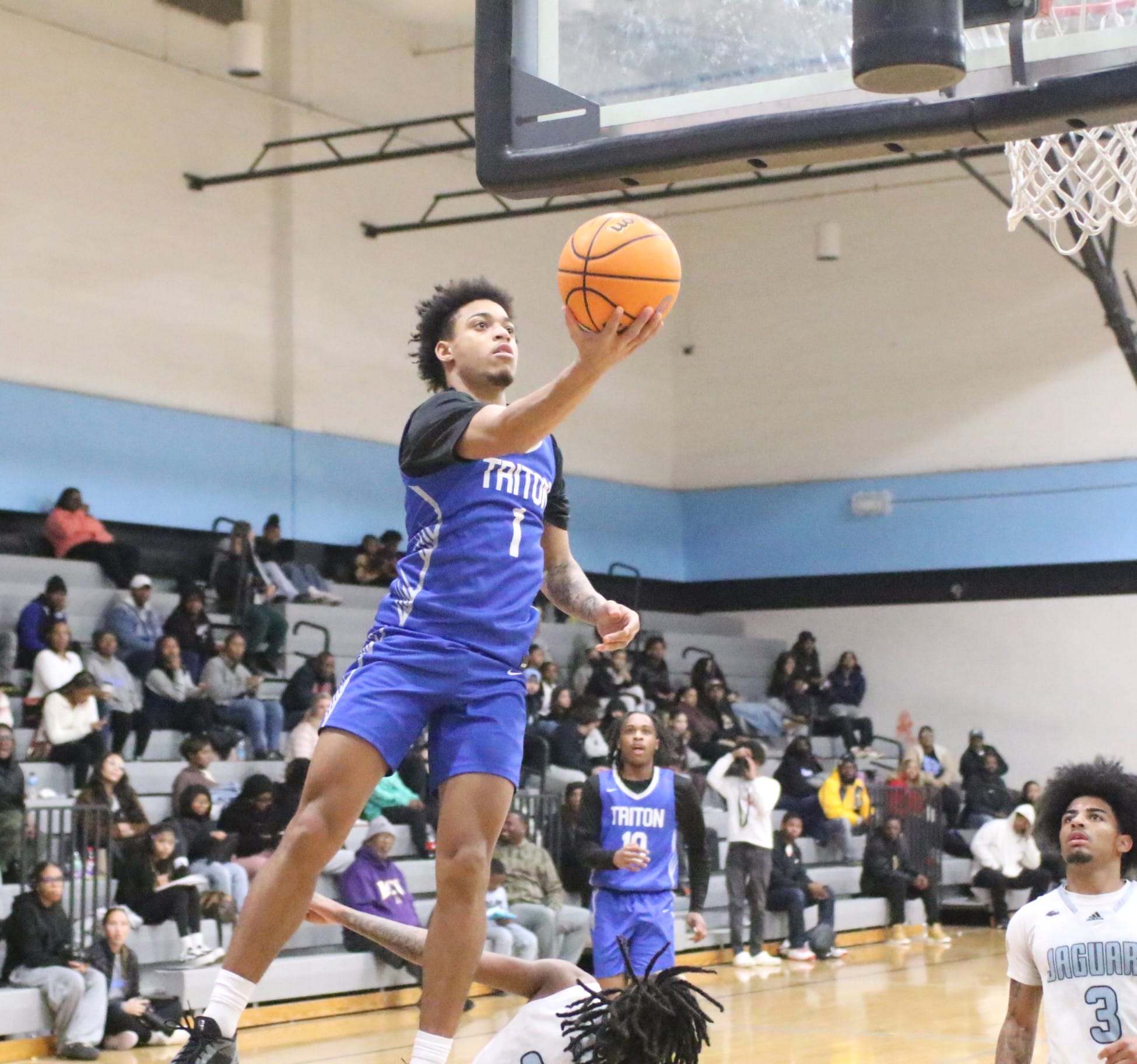 Triton boys win, 75-50, at Overhills as inspired effort reverses earlier outcome