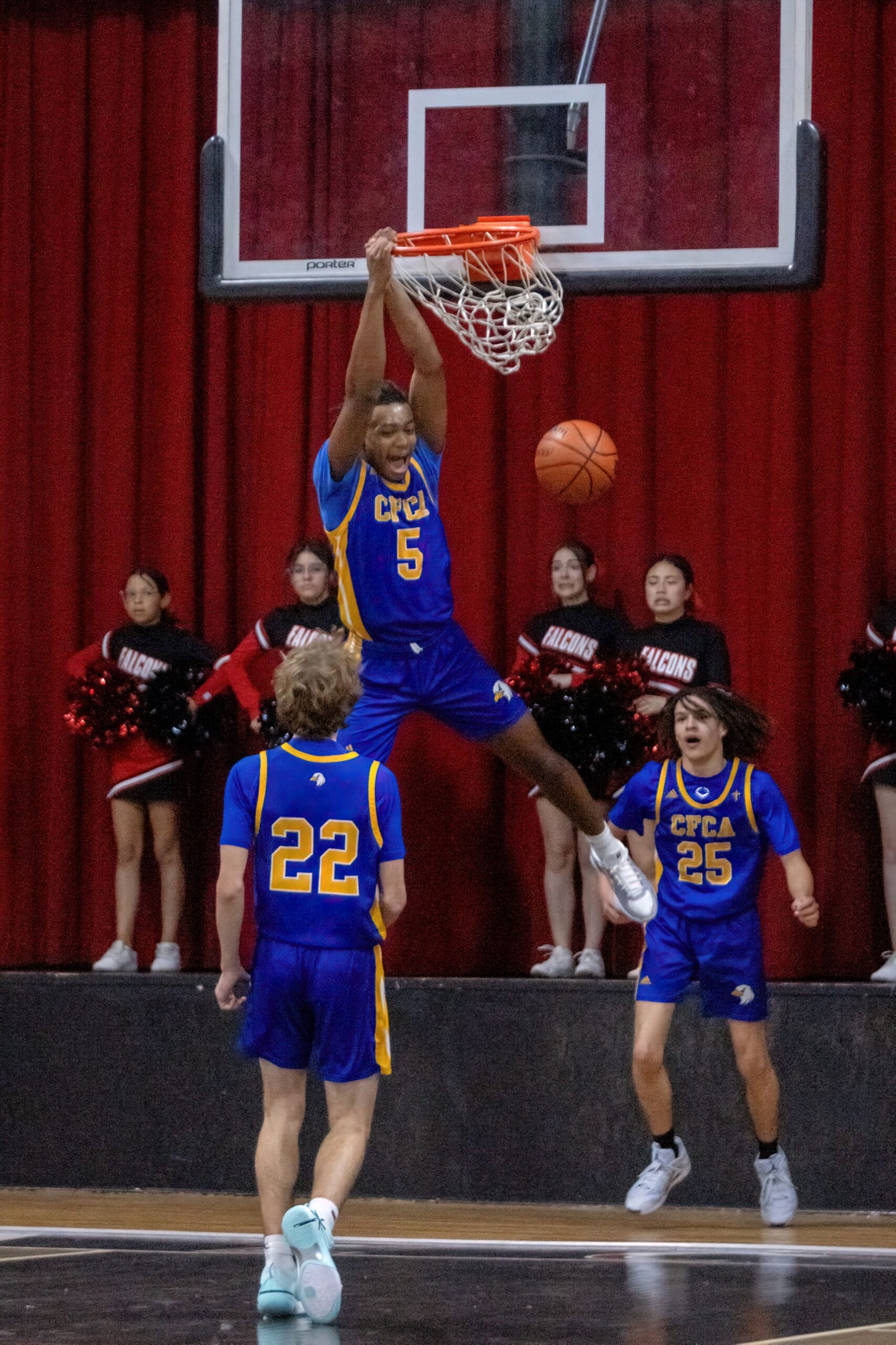 CFCA varsity boys pull away to 70-48 win at Lee