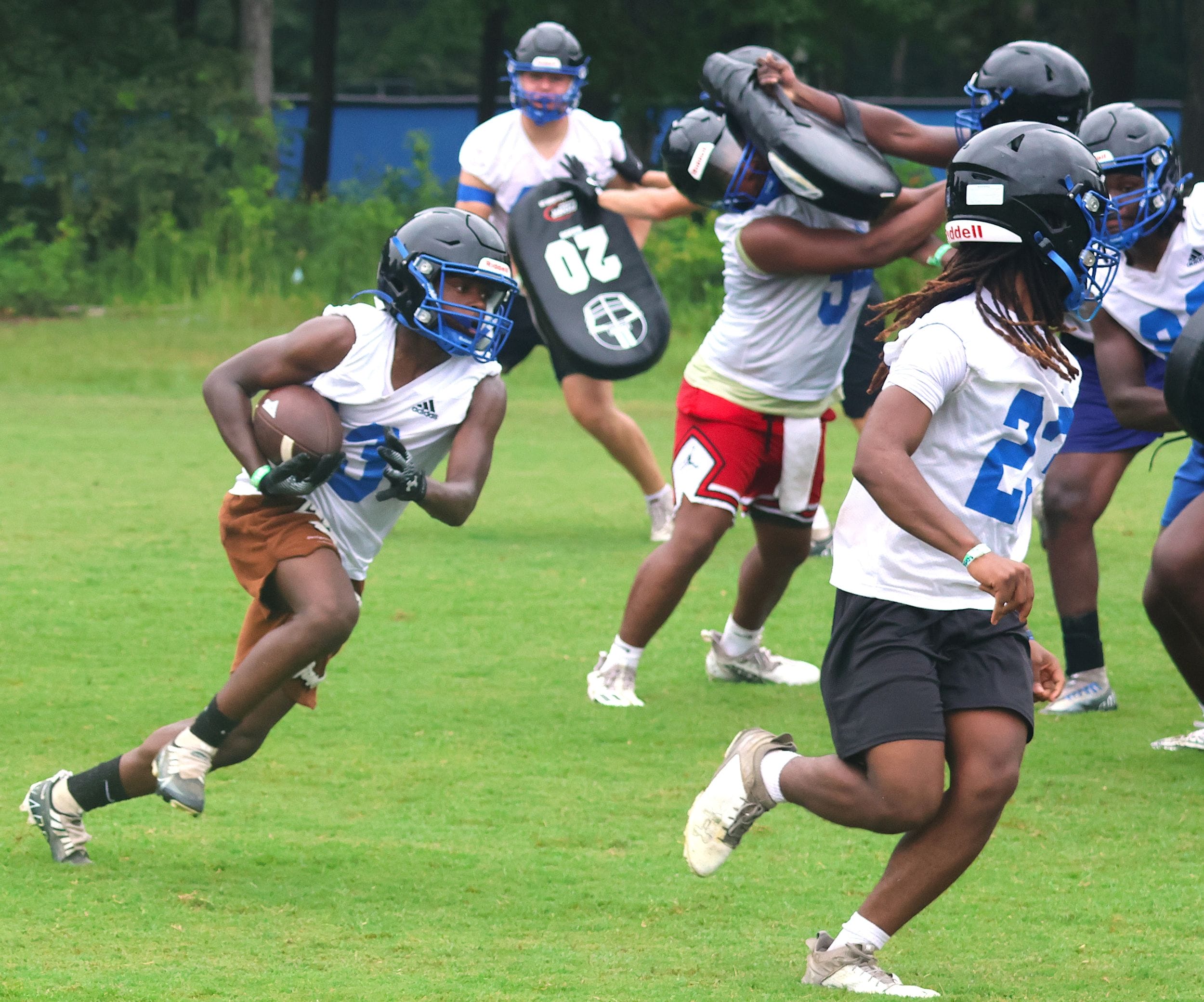Hawks get football practice going with 91 players out